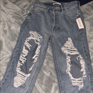 Size 24 BRAND NEW PacSun ripped jeans.